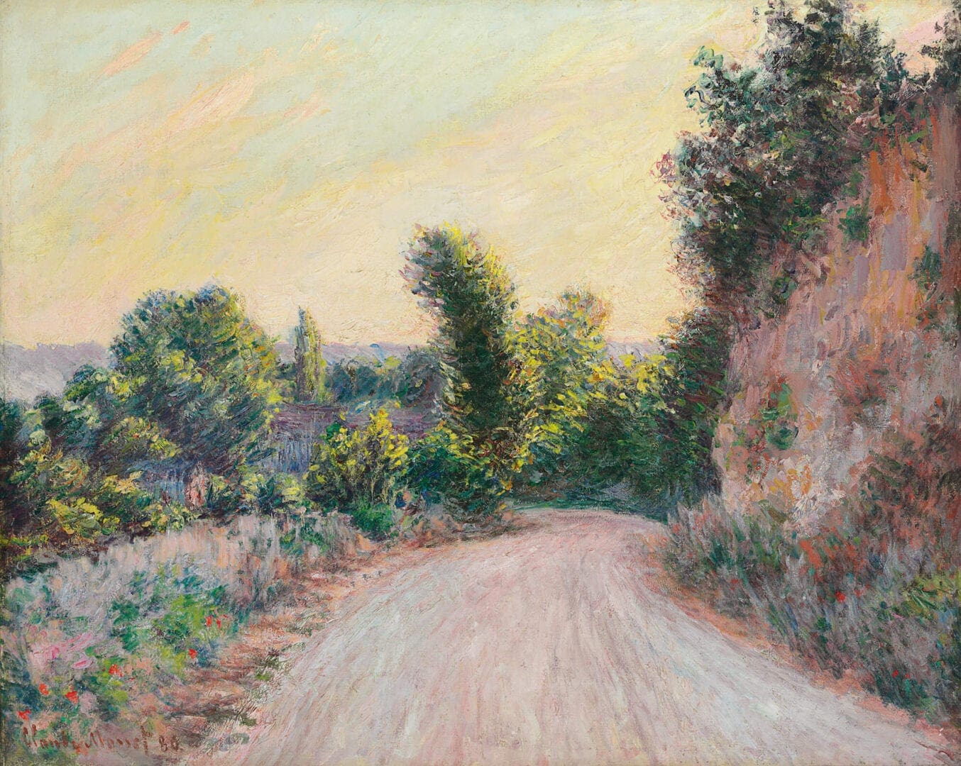 Sunlit country dirt road with trees